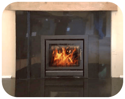 Inset/ Cassette Style Woodburner on granite hearth with granite slips fitted